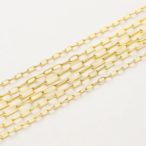Macro view of various 18K gold plated paperclip and oval link chains for DIY jewelry making