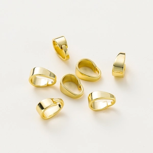 Close-up of 14K gold plated jewelry bails with polished finish for DIY necklace making