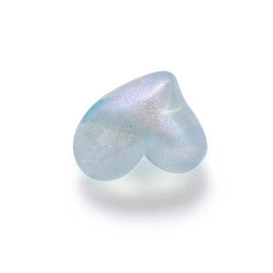 Close-up of a translucent light blue heart bead with iridescent glitter and drill hole