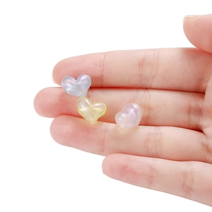 Pearlescent acrylic heart beads for DIY jewelry making in blue yellow and pink tones