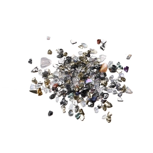 Macro view of iridescent irregular crushed glass sand for nail art and DIY crafts