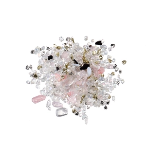 Detailed mix of iridescent crystal stones, pearls, and golden flakes for DIY nail art