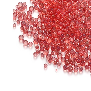 Macro shot of red translucent glass bubble beads for DIY nail art and jewelry making