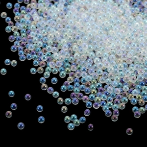 Macro detail of iridescent aurora glass beads for nail art and DIY jewelry making