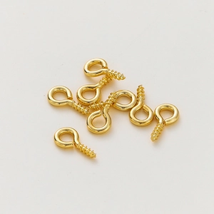 Detailed view of bulk 14K gold-plated screw eye pins for DIY jewelry making and crafts