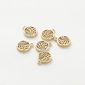 Detailed macro view of six 18K gold plated hollow Fu character charms for DIY jewelry