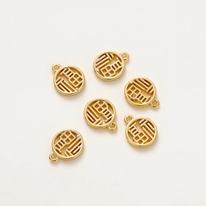 Detail of 18K gold plated Fu character charms with hollow design for DIY jewelry making