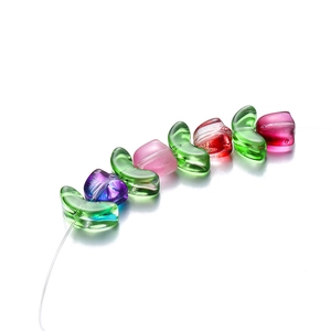 Macro shot of colorful glass tulip petal beads for DIY necklace jewelry making