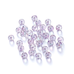 Macro-detail van paarse acryl kralen met glitters voor het maken van DIY-sieraden