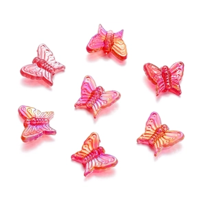 Macro view of 13mm gradient acrylic butterfly beads showing wings texture and structure
