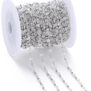 Detail of crystal glass square beads on silver metal chain for DIY jewelry making
