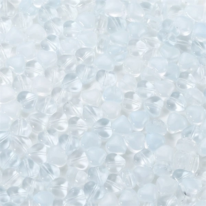 Macro detail of light blue heart-shaped glass beads with frosted and clear textures