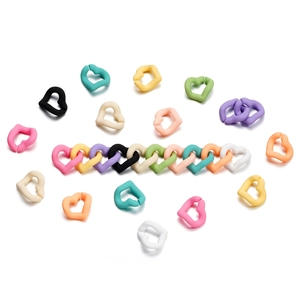 Detail of colorful frosted heart acrylic links for DIY phone chains and craft jewelry