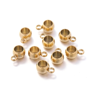 Vue détaillée de neuf perles à bélière en acier inoxydable doré 6mm pour bijoux DIY