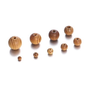 Polished maple wood beads with natural grain and pre-drilled holes for DIY jewelry