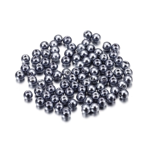 Detailed view of 4mm dark metallic grey glass pearls with precision drilled holes for DIY