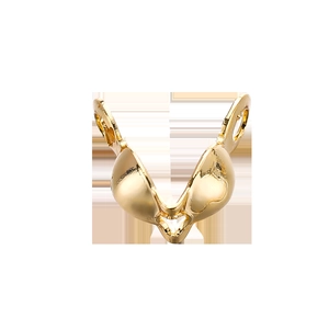 Detalle de conectores de doble bucle chapados en oro de 18K para crear joyería DIY