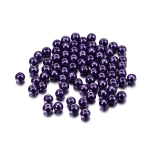 Macro shot of 4mm purple glass imitation pearls with center holes for DIY jewelry