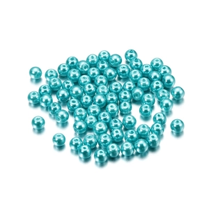 Close-up of 4mm light blue glass imitation pearls with glossy finish and center holes