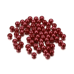 Macro shot of 4mm burgundy faux glass pearls with straight holes for jewelry making
