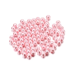 Detailed view of pink 4mm glass imitation pearls with pre-drilled holes for DIY jewelry