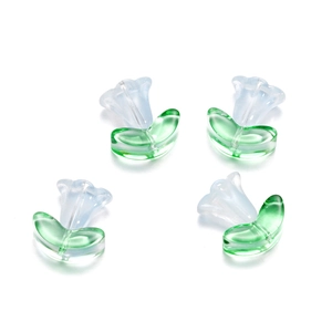 Detailed view of handmade glass tulip beads with green leaves for DIY jewelry making