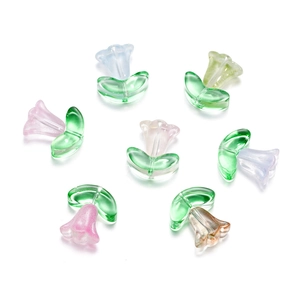 Macro detail of colorful trumpet flower glass beads for DIY jewelry with through-holes