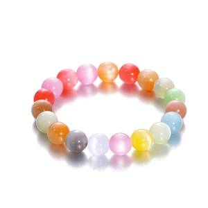 Macro detail of multi-colored cat-eye resin beads for handmade jewelry making