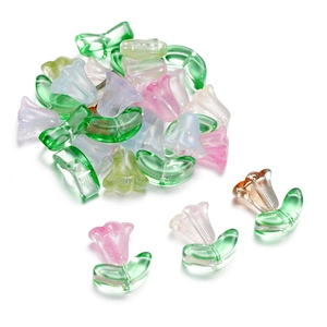 Macro shot of glass trumpet flower and leaf beads for DIY jewelry making