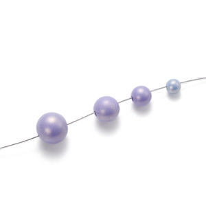 Lustrous lavender macaron acrylic pearls in various sizes for DIY jewelry making