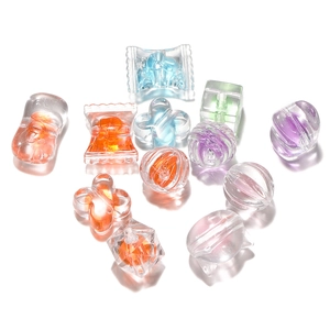 Close-up of colorful acrylic frosted core beads in heart and star shapes for DIY jewelry