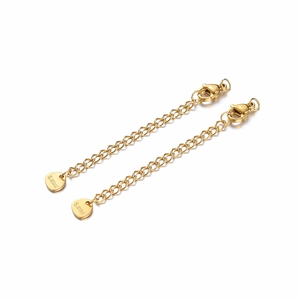 Close-up of golden stainless steel extender chains with lobster clasp and heart pendant