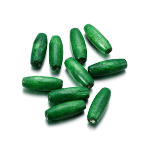 Macro shot of green oval wooden beads with natural grain and 2.5mm hole for DIY crafts