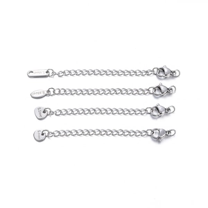 Detail of 7cm stainless steel extender chains with lobster clasps and four tag shapes