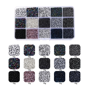 Macro detail of 15-grid glass seed beads set with 10g colorful beads for DIY jewelry