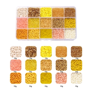 Detail of 15-grid box containing various colors of 10g glass seed beads and bugle beads