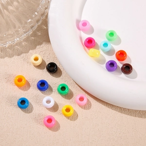 Close-up of vibrant acrylic large hole beads in various colors for DIY jewelry making