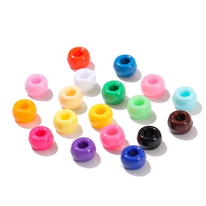 Macro shot of colorful acrylic pony beads for DIY jewelry and necklace crafting