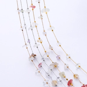 Detail of colorful natural stone beads and metal spacer cubes for DIY jewelry making