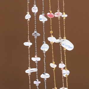 Macro detail of bohemian copper block necklaces with natural semi-transparent raw stones
