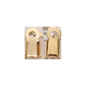 Detailed view of golden metal fold-over cord ends with round hanging loops for DIY jewelry