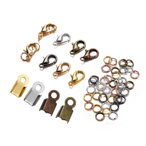 Detailed close-up of colorful DIY jewelry findings set with lobster clasps and jump rings