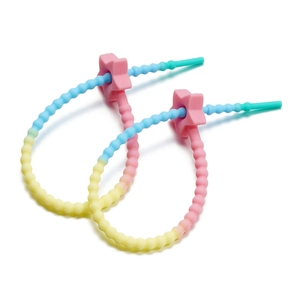 Macro detail of gradient star silicone cable ties with colorful beaded texture