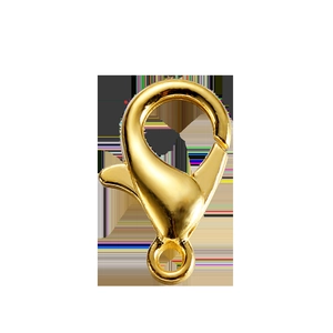Detail of a gold-plated lobster clasp for jewelry making with polished metal surface