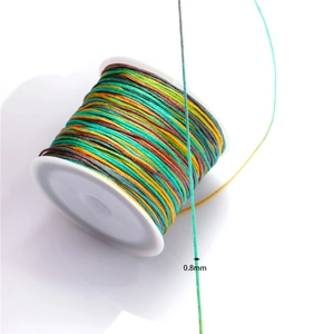 0.8mm multi-color gradient nylon cord for jewelry making on a white spool