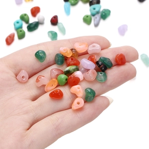 Close-up of irregular 5-8mm colorful acrylic beads for DIY jewelry making