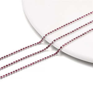 Close-up of 2mm pink crystal rhinestone claw chain with silver metal base for DIY decor