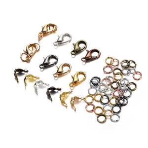 Macro shot of assorted jewelry making findings set with lobster clasps and jump rings
