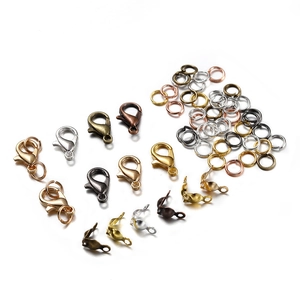 Detailed set of lobster clasps, jump rings, and fold-over crimps in various metal finishes