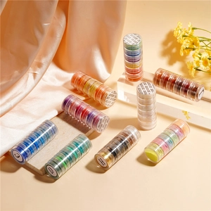 Close-up of 6-color pearlescent nail glitter powder set in stackable clear jars for DIY crafts